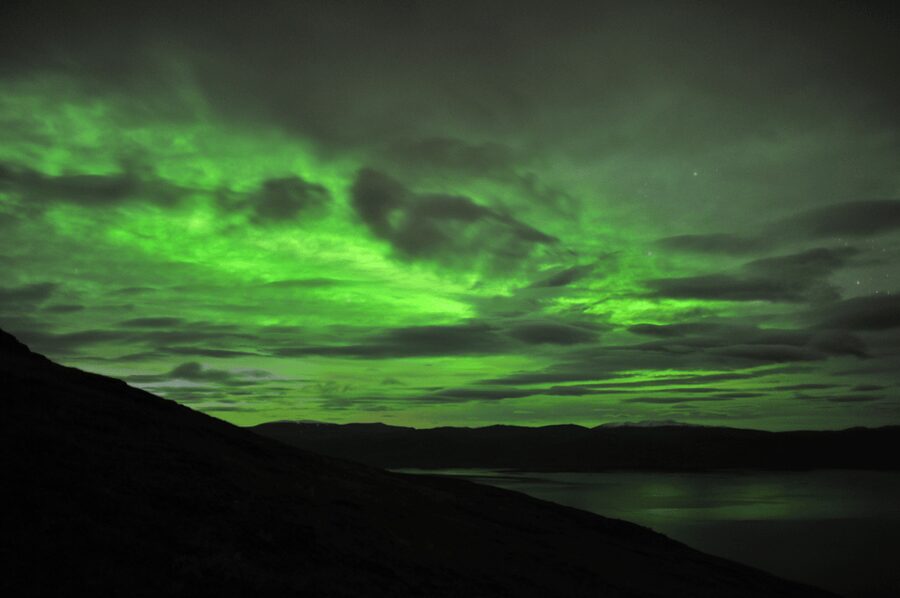 Abisko: Guided Autumn Aurora Chase with Hotel Transfers - Björkliden, Bear Mountain, and the Torne River