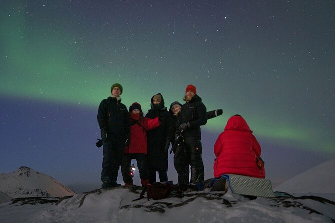 Adults Only Aurora Hunt with Wandering Owl - Chasing a break in the Arctic clouds