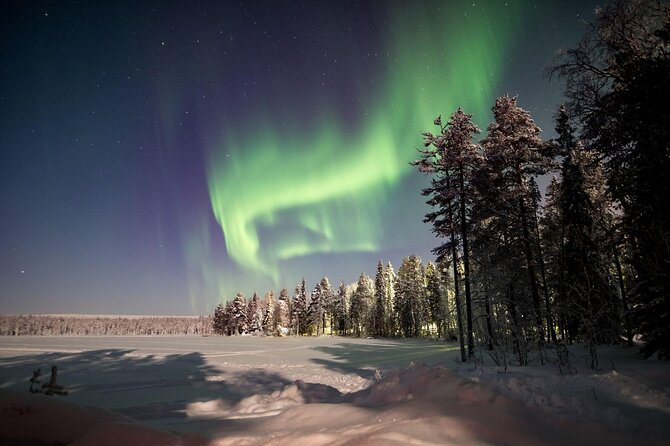 Aurora Arctic Ice Floating in Rovaniemi, Small-group - Getting into the thermal rescue suit