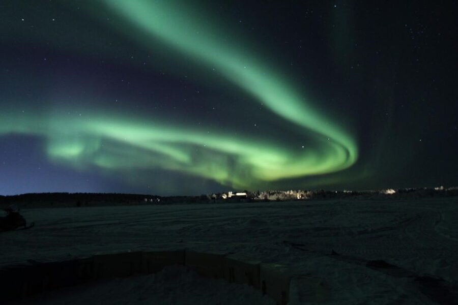 Aurora Hunt on Snowmobile - small groups - Hunting the Northern Lights without city glare