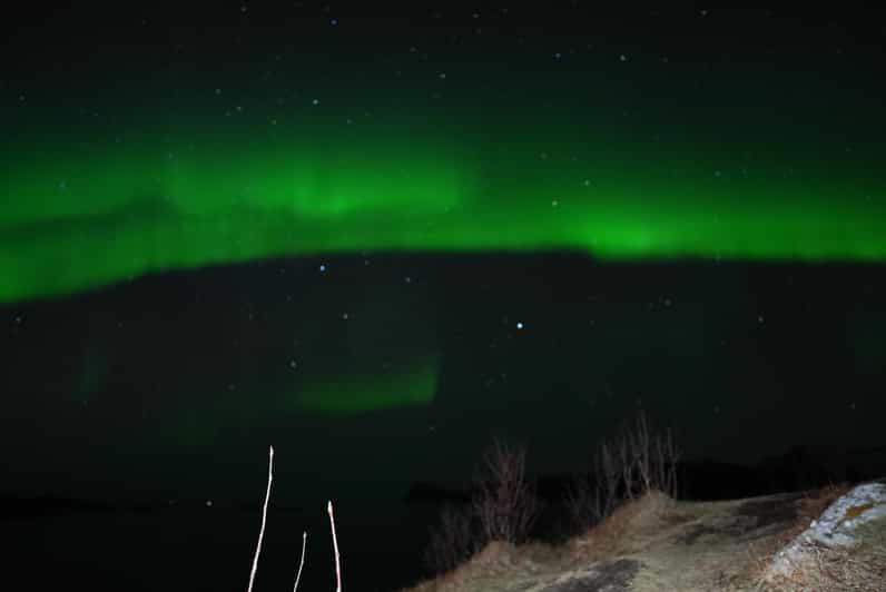 Chase the Magic of the Northern Lights in Tromsø Norway - Campfire, cocoa, and waiting in the cold