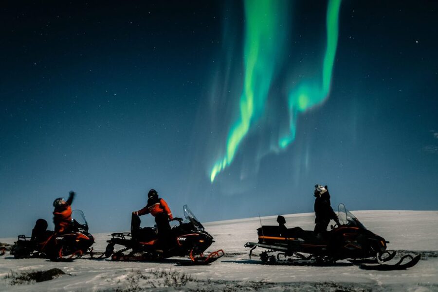 From Alta: Northern Lights Night Adventure By Snowmobile - Riding the old postal road toward Beskardes