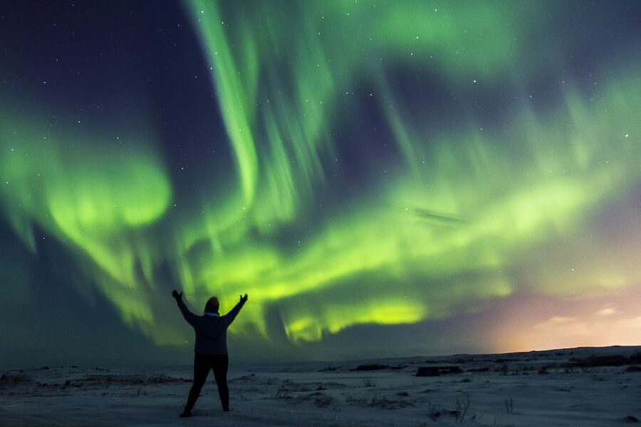 From Reykjavik: Northern Lights Bus Tour with Hot Cocoa - Leaving Reykjavik for a darker sky