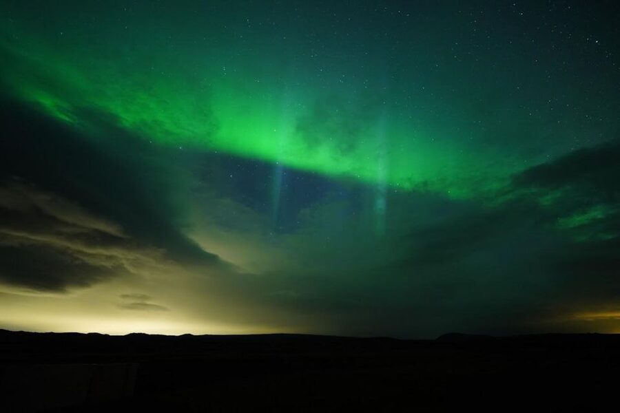 From Reykjavík: Northern Lights Tour with Hot Cocoa & Photos - What the heated minibus adds