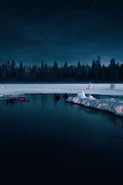 From Rovaniemi: Ice Floating under Aurora Borealis - Warm drinks, cookies, and a Finnish tent