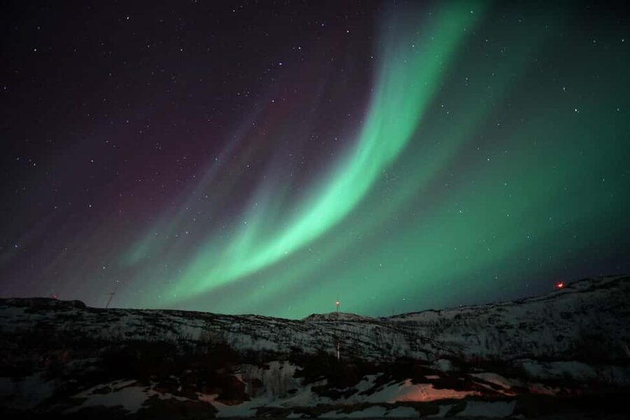 From Tromsø: Aurora Bus Tour with Snacks, Photos, and Drinks - Meeting the guides at Tromsø’s harbor