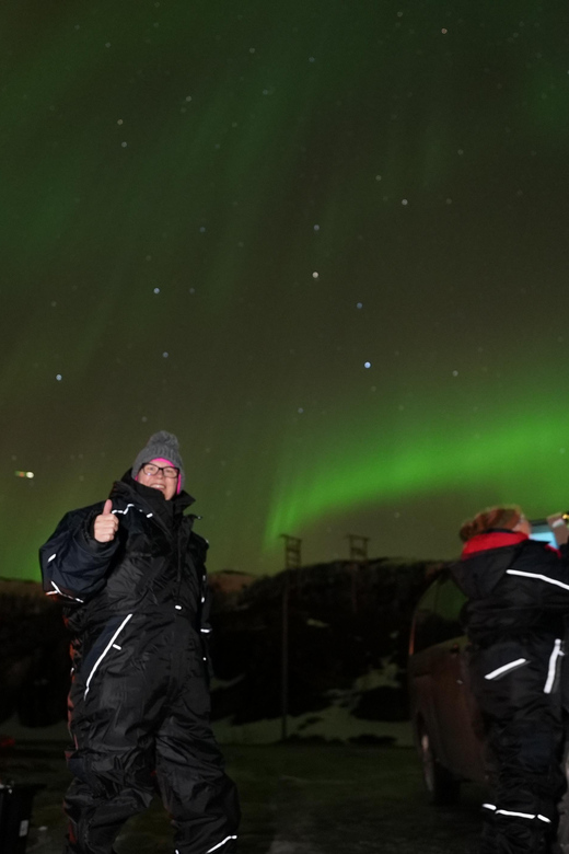 From Tromsø: Northern Lights Tour with Hot Drinks and Photos - Warm suits, spikes, and the real meaning of comfort