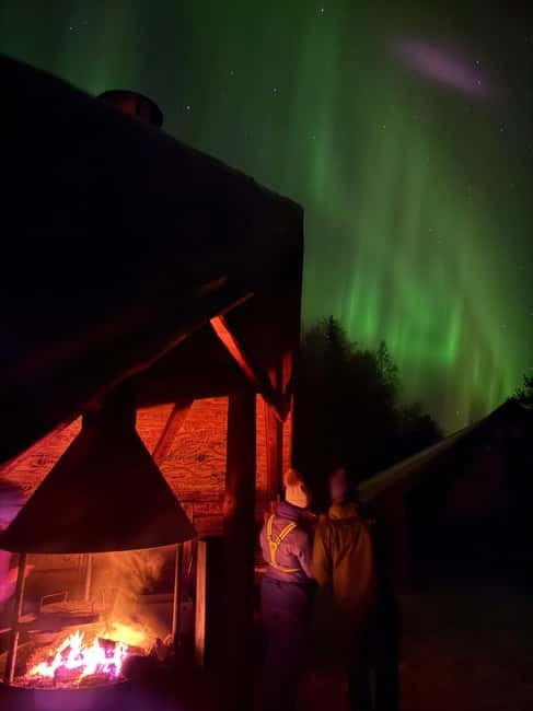 Guarantee Northern Lights Hunt by Minibus With Local Guide - Chasing the aurora instead of watching one parking lot