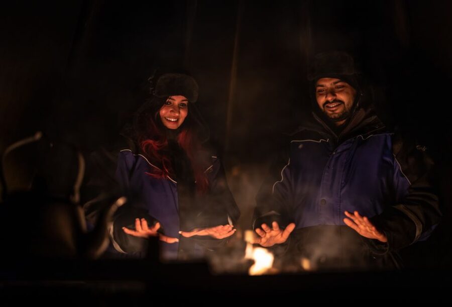 Ivalo: Lake Inari Northern Lights Tour w/ Reindeer & Dinner - The snowmobile sleigh across frozen Lake Inari