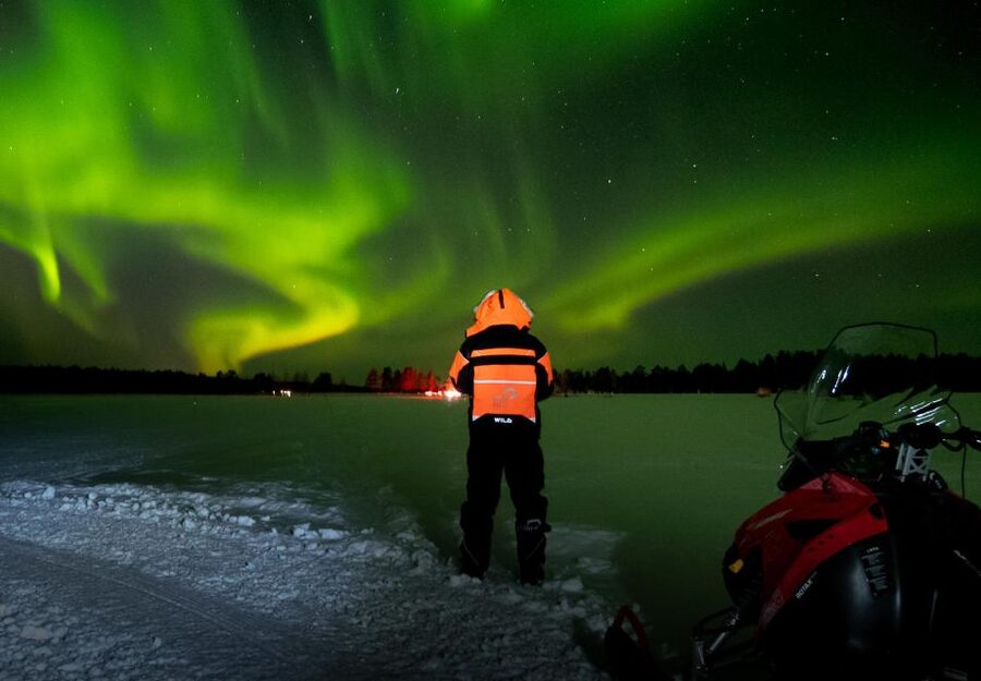 Levi: Northern Lights Snowmobile Tour with Snacks and Drinks - A small fire, sausage, and hot juice