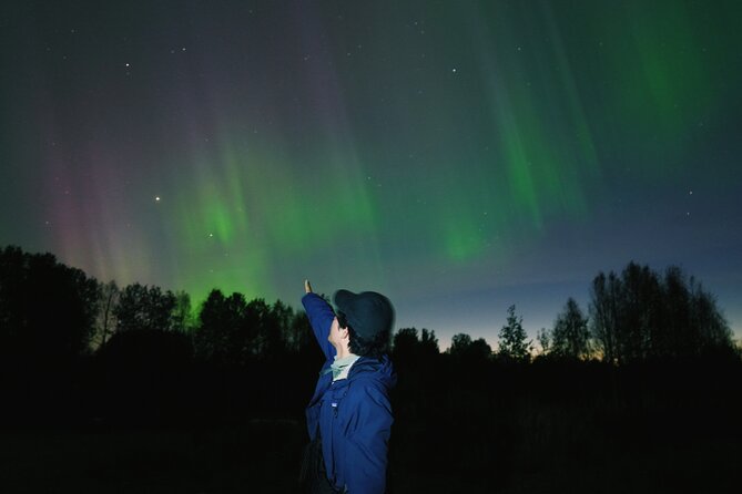 Northern lights hunting photo tour with bbq; small groups - The first stop: frozen water, open sky, and waiting