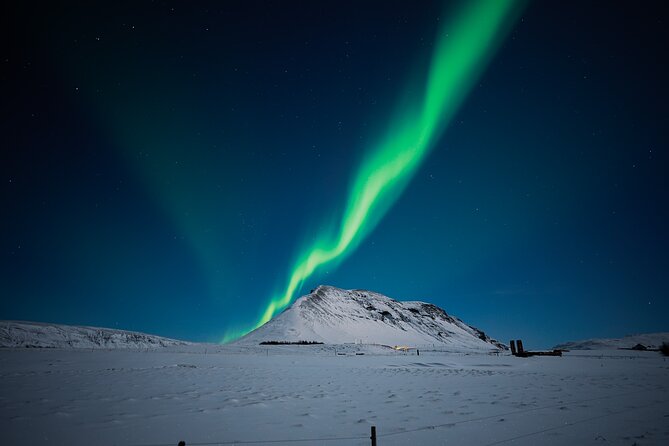 Northern Lights Tour with Photos, Snacks, Warm Snowsuits, Chairs - Included photography and help with your camera