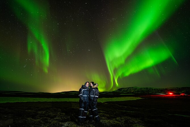 Northern Lights Tour with Photos, Snacks, Warm Snowsuits, Chairs - Waiting in the southern Icelandic countryside