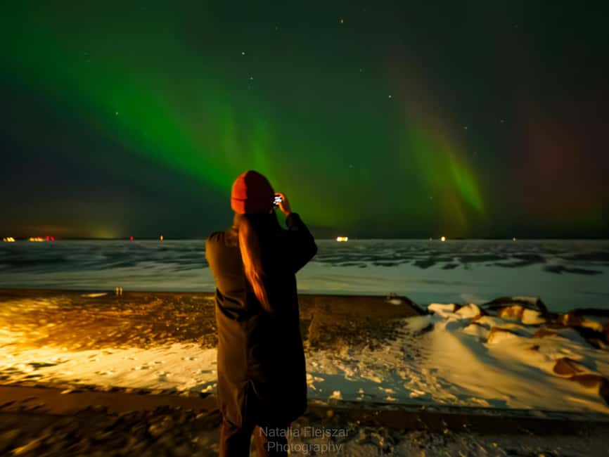 Oulu: Guided Night Walking Tour with Northern Lights Hunting - Nallikari beach, the lighthouse, and the frozen sea