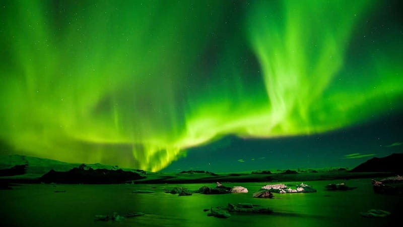 Reykjavik: Northern Lights Adventure Tour with Hot Chocolate - Leaving Reykjavik for a darker sky