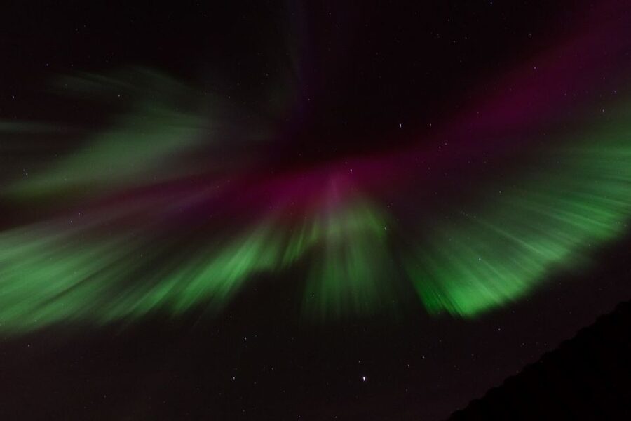 Reykjavik: Northern Lights Motor Yacht Cruise - The city sights between sky checks