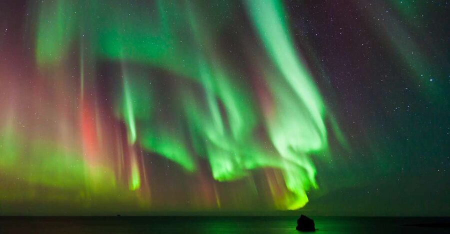 Reykjavik: Premium Northern Lights Tour with Free Photos - Leaving Reykjavík in search of a clear sky