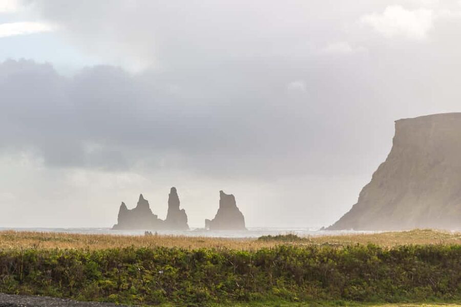 Reykjavik: South Coast, Glacier Hike & Northern Lights Combo - Reynisfjara brings black sand, columns, and sea stacks
