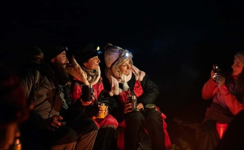 Tromsø: All inclusive Aurora Hunt with photos, food & drinks - The minibus ride through Tromsø’s changing weather