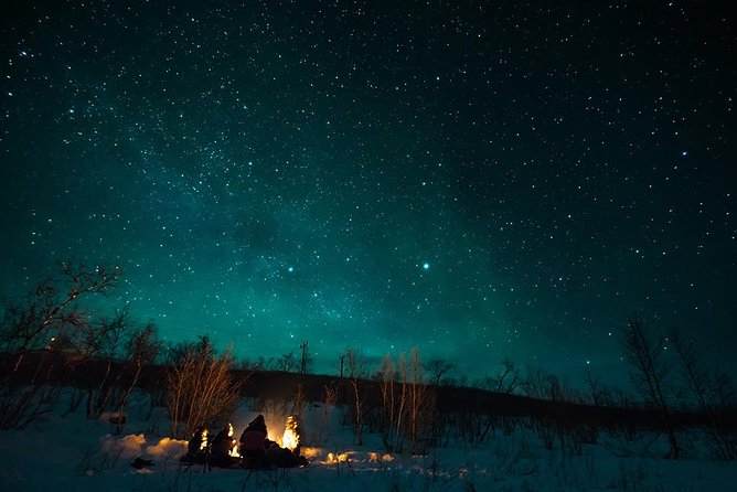 Tromso Aurora Hunt with Bonfire, Soup, Winter Gear & Transfers - Thermal suits help, but your own layers still matter