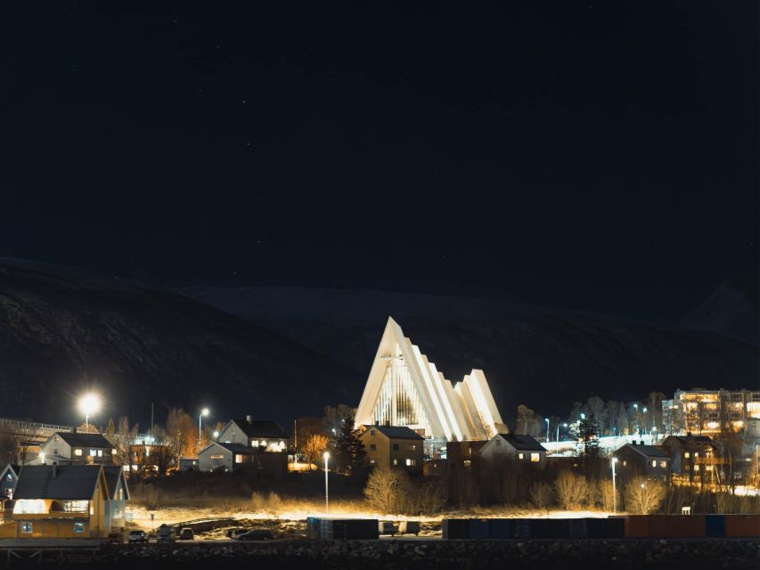 Tromsø: Electric Northern Lights Cruise - The return view of Tromsø is part of the experience