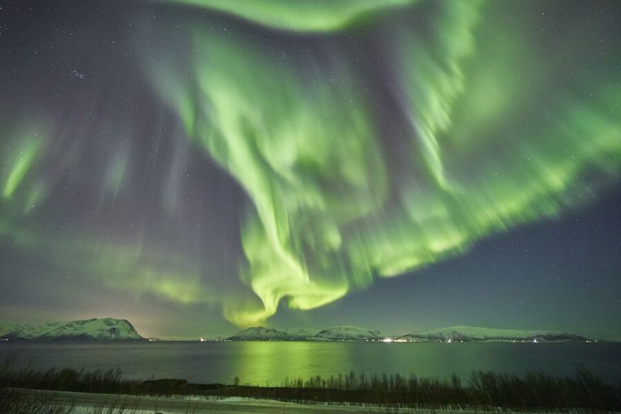 Tromso: Minivan Aurora Excursion with Pictures & Warm Suits - Driving toward clear skies