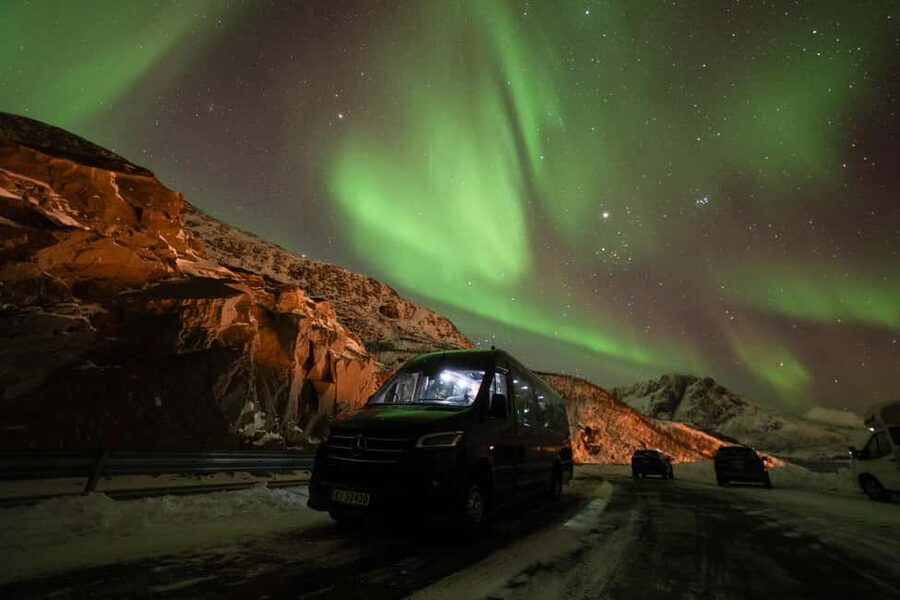 Tromsø: Northern Lights Minibus Tour with Local Experts - Fjords, beaches, and dark sky stops