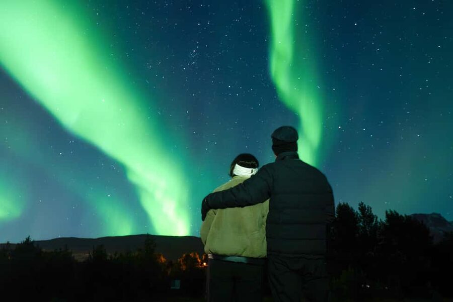 Tromsø: Northern Lights Tour with Local Stories & Photos - The search for a clear patch of sky
