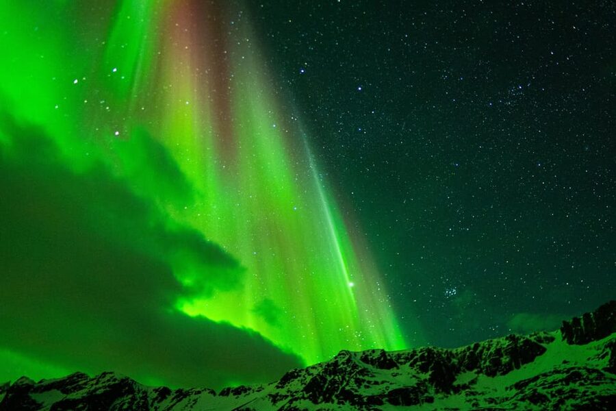 Tromsø: Small-Group Adventurous Northern Lights Hunt - Walking through snow to a darker spot