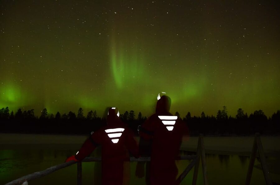 Ylläs: Northern Lights Ice-Floating Experience with Transfer - The fairy-lit walk to the ice hole